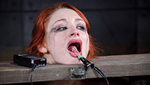 Violet Monroe has electrical clamp on her tongue