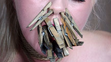 Dresden's tongue and nose covered in clothespins