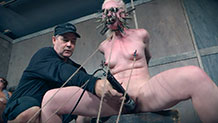Dresden covered in clothespins being vibrated with hitachi