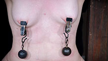 Dresden's tits pulled down by nipple clamps and weights