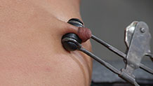 Nikki Darlin in metal nipple clamp
