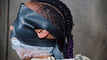 Nikki Darling in tape gag and blindfold