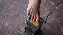 Nikki Darling's foot on tiptoes electrical play